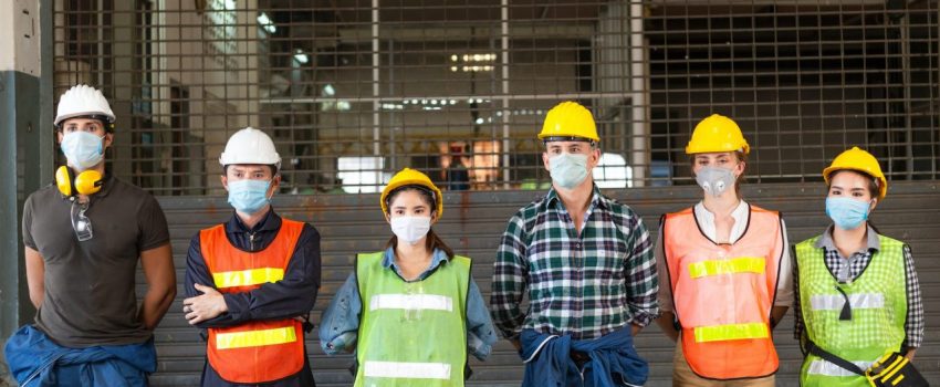 group-of-industrial-people-standing-at-industrial-factory.jpg